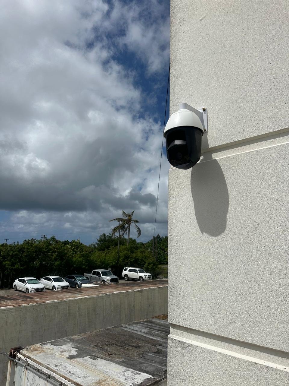Exterior surveillance camera installed on a commercial building.