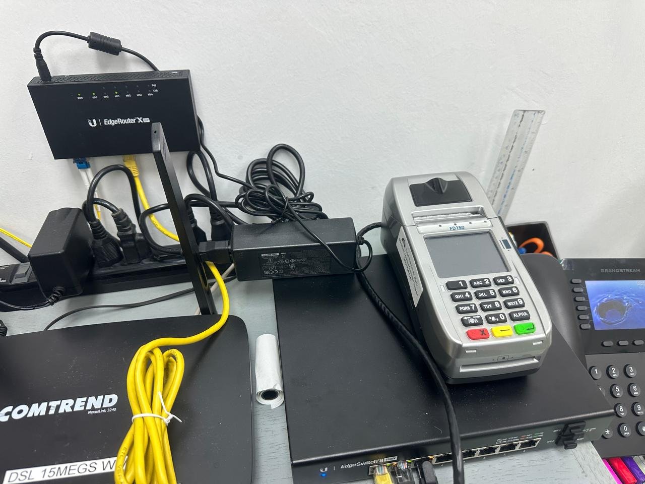 Client-supplied image of network, communications, and telephone equipment.