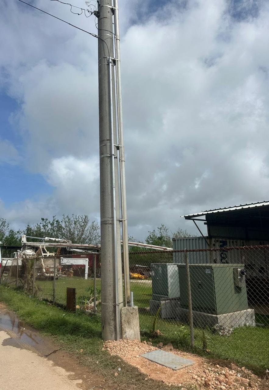 Client-supplied field image of exterior conduit and utility infrastructure.